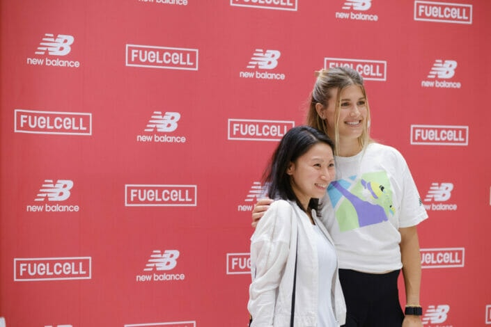 famous female sports player photo signing session in Vancouver for new balance