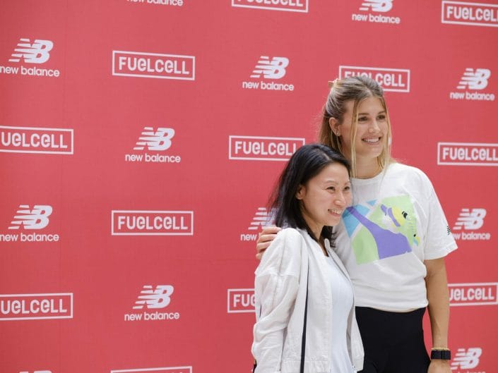 famous female sports player photo signing session in Vancouver for new balance