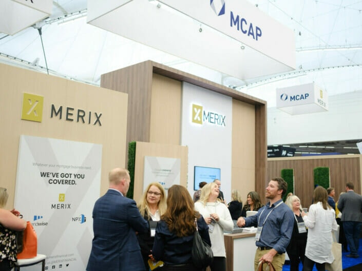 attendees interacting at a conference in Vancouver