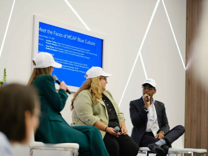 guest speakers talking on a panel at a conference in Vancouver