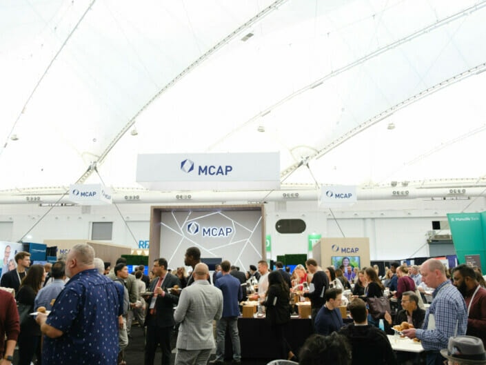 large attendance at a financial tradeshow conference at the Vancouver Convention Centre