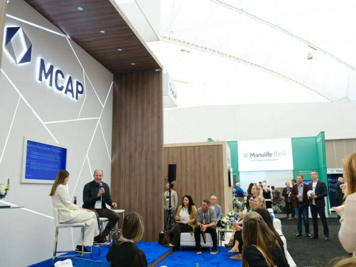 man speaking to an audience at a conference held at the Vancouver convention centre