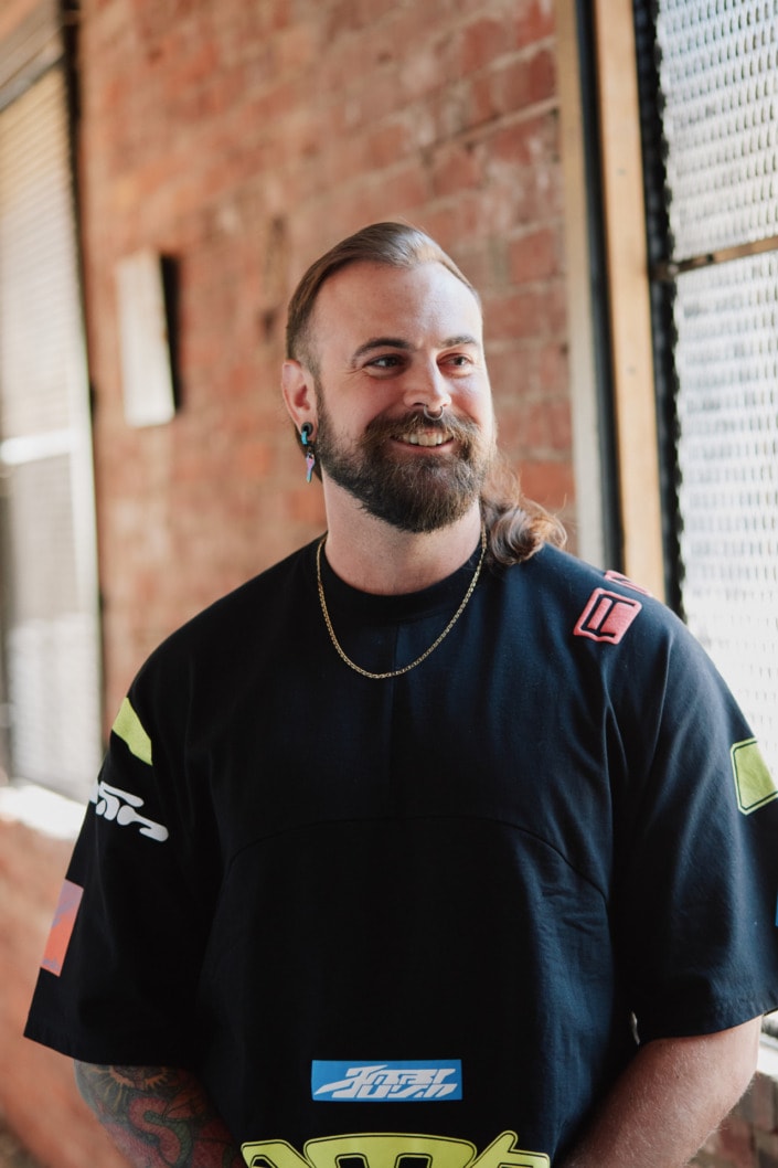 male environmental professional portrait taken in vancouver brick building