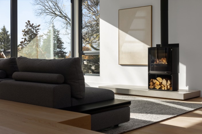 architectural interior photo of living room with warm fireplace